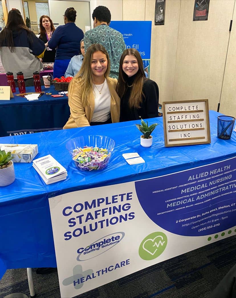 A photo of our account managers at a career fair